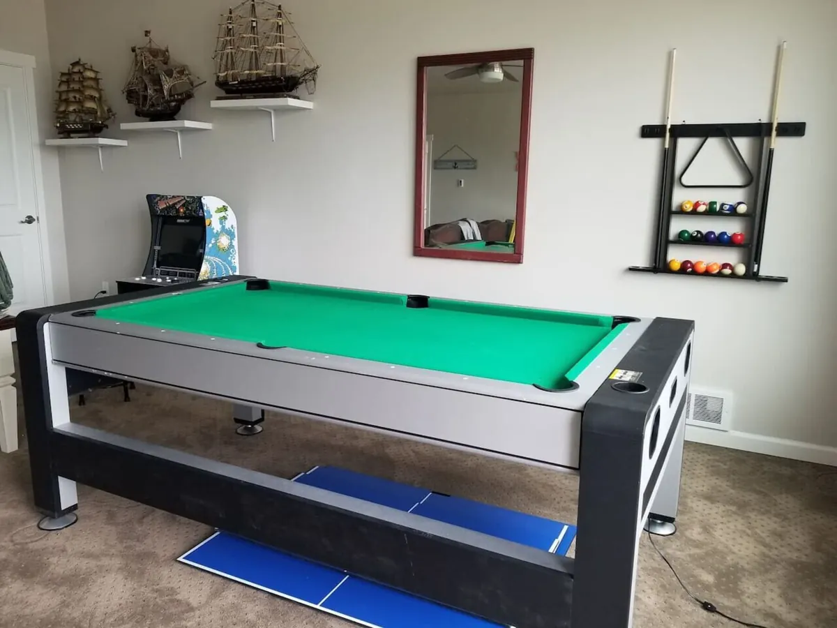 Pool table in the Beach Escape game room